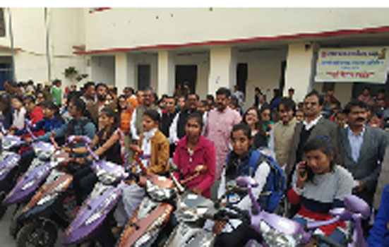 Scooty distributed to talented students