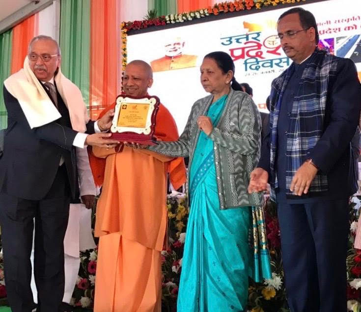 Dr. Mahesh Gupta, Chairman, Kent RO received special recognition by Anandiben Patel, 